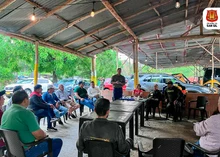 Encuentro comunitario con los habitantes y comerciantes de la carrera primera