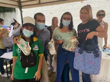 Entrega de elementos donados por la DIAN a niños y jóvenes de la Unidad de Atención Integral UAI